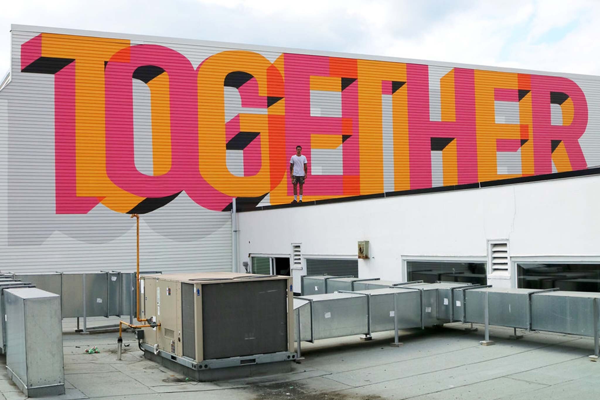 Mural Artist Benjamin Johnston's art collaboration with Raycam Community Centre for Vancouver Mural Festival in Strathcona .jpg